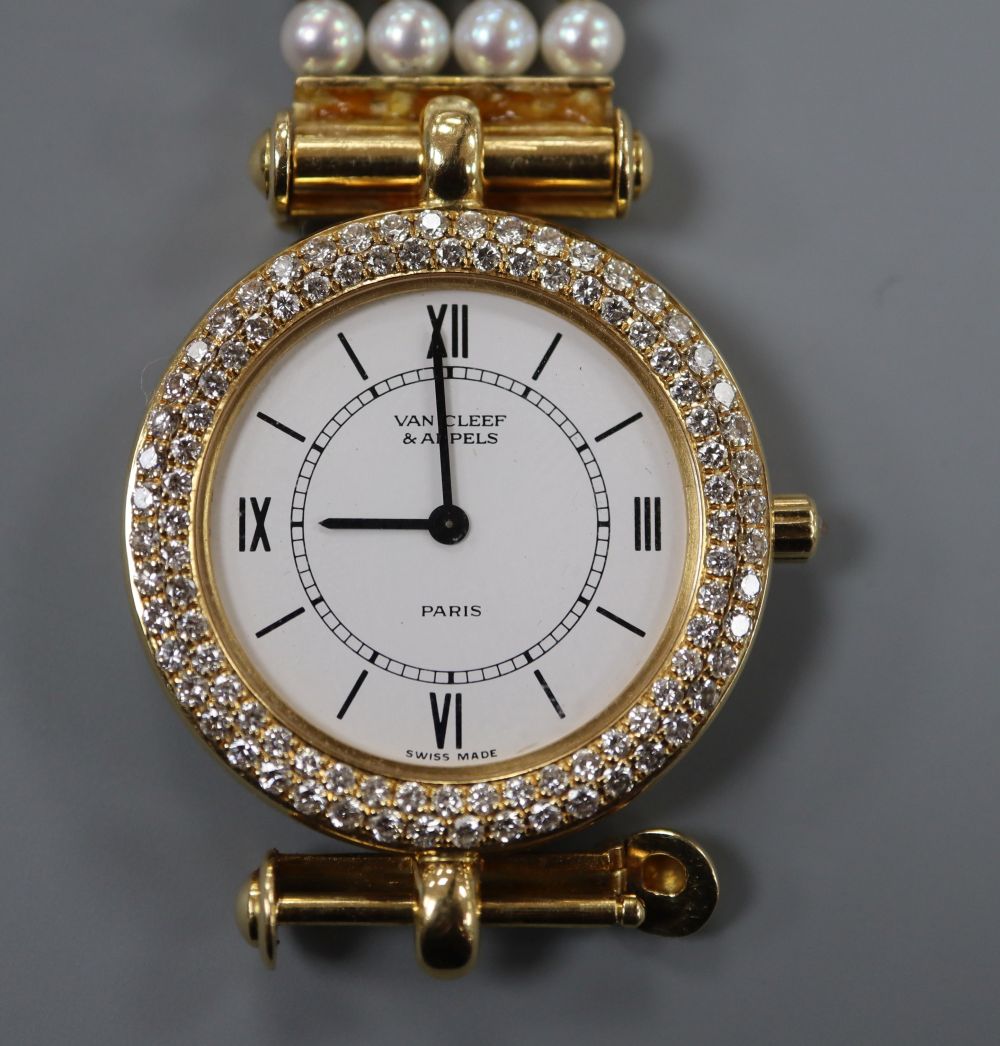 A ladys 18ct gold, seed pearl and diamond set Van Cleef and Arpels quartz bracelet watch, 17.5cm, gross 40 grams.